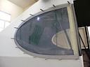 Rear windows are glued, then framed